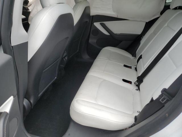 Photo 11 from auction – 2021 TESLA MODEL Y with VIN 5YJYGDED8MF110433