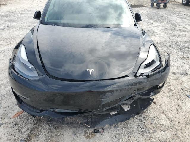 Photo 12 from auction – 2021 TESLA MODEL 3 with VIN 5YJ3E1EA9MF911649