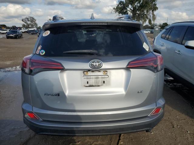 Photo 6 from auction – 2018 TOYOTA RAV4 LE with VIN 2T3ZFREV3JW420766
