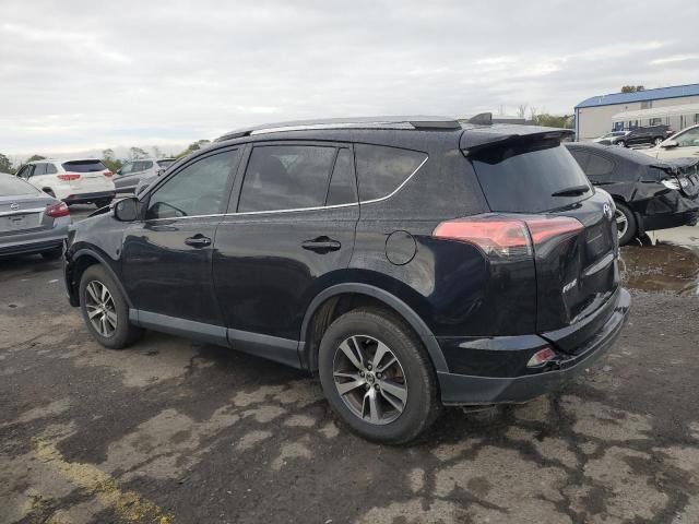 Photo 2 from auction – 2017 TOYOTA RAV4 XLE with VIN 2T3RFREV4HW637723