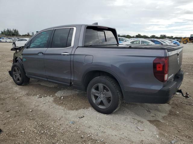Photo 2 from auction – 2021 HONDA RIDGELINE with VIN 5FPYK3F78MB018666