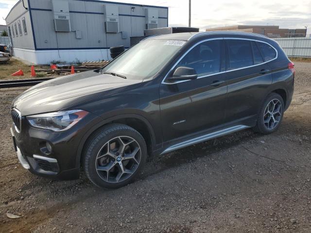BMW X1 XDRIVE2 2017 with VIN WBXHT3C32H5F73326 - Photo from auction