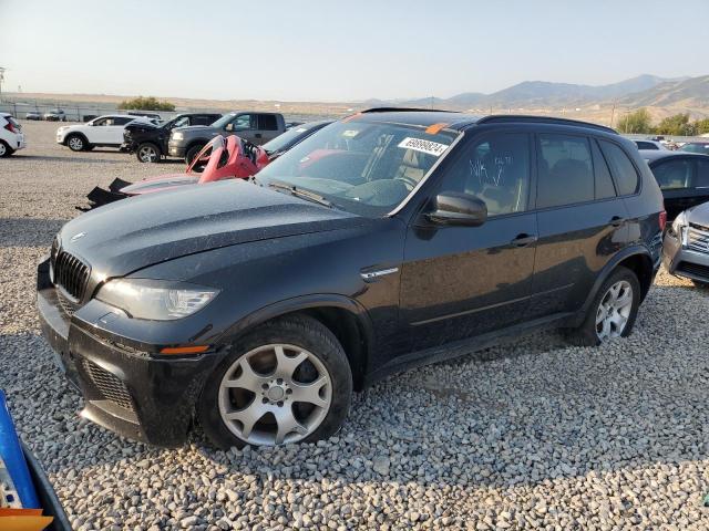 BMW X5 M 2011 with VIN 5YMGY0C55BLK26381 - Photo from auction
