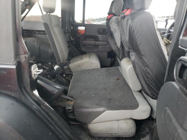 Photo 11 from auction – 2009 JEEP WRANGLER U with VIN 1J8GA59149L766192