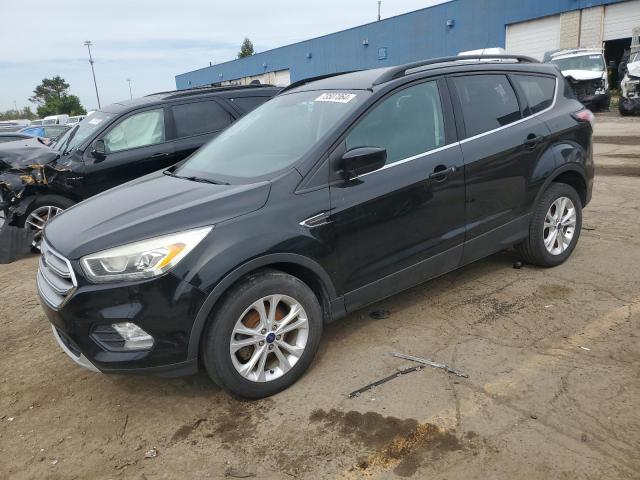FORD ESCAPE SE 2017 with VIN 1FMCU0GD7HUE70844 - Photo from auction