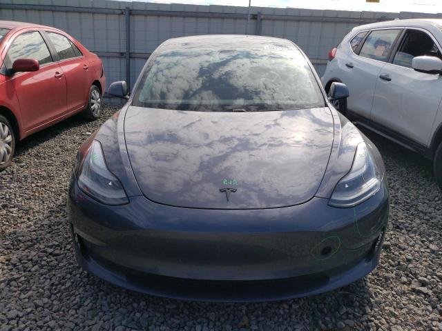 Photo 5 from auction – 2021 TESLA MODEL 3 with VIN 5YJ3E1EBXMF938402