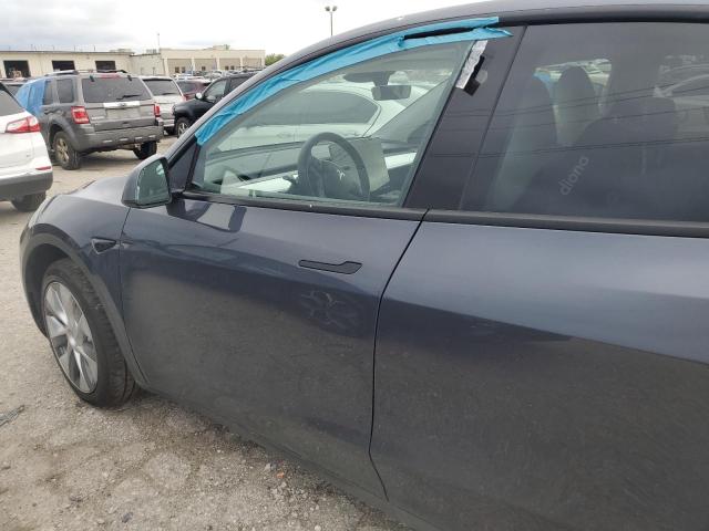 Photo 7 from auction – 2023 TESLA MODEL Y with VIN 7SAYGAEE2PF845567