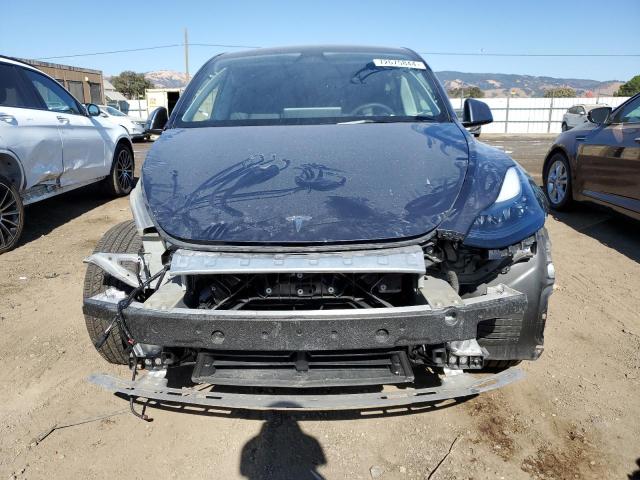 Photo 5 from auction – 2023 TESLA MODEL Y with VIN 7SAYGDED8PF972087