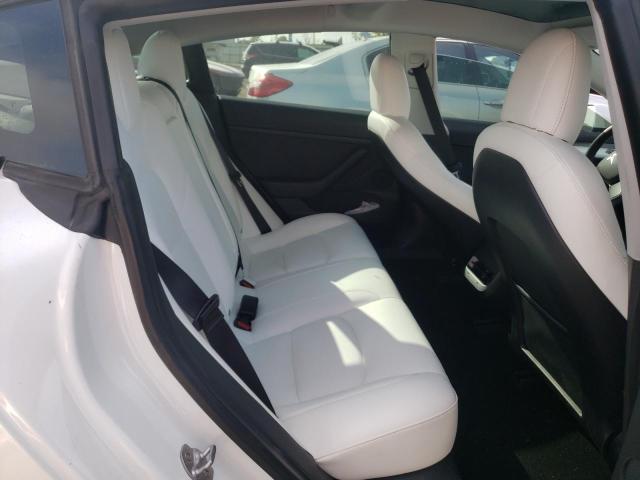Photo 10 from auction – 2021 TESLA MODEL 3 with VIN 5YJ3E1EA3MF024595