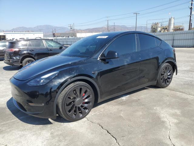 TESLA MODEL Y 2022 with VIN 7SAYGDEF3NF445587 - Photo from auction