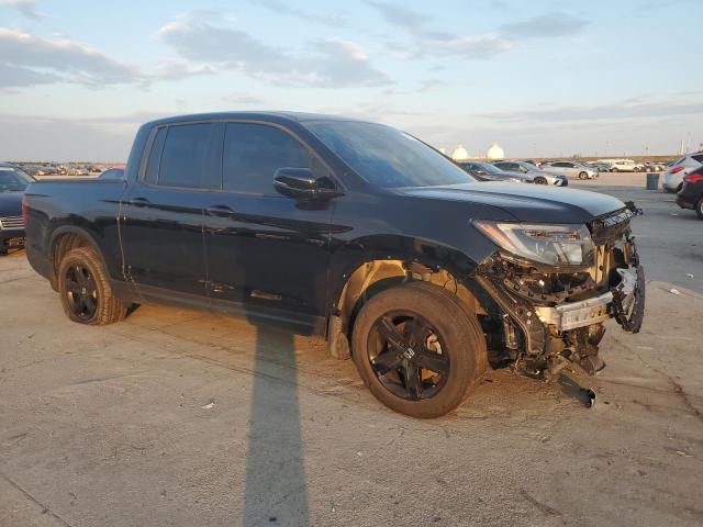 Photo 4 from auction – 2022 HONDA RIDGELINE with VIN 5FPYK3F81NB011035