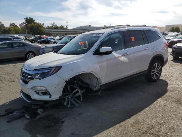 HONDA PILOT ELIT 2017 with VIN 5FNYF6H04HB067271 - Photo from auction