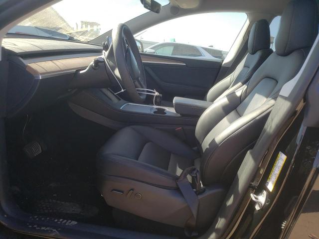 Photo 7 from auction – 2023 TESLA MODEL Y with VIN 7SAYGDEE0PA174933
