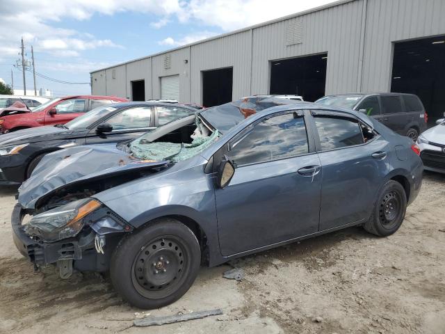 TOYOTA COROLLA L 2018 with VIN 5YFBURHE5JP835858 - Photo from auction