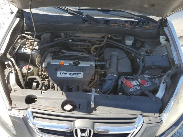 Photo 12 from auction – 2004 HONDA CR-V LX with VIN JHLRD78424C014890