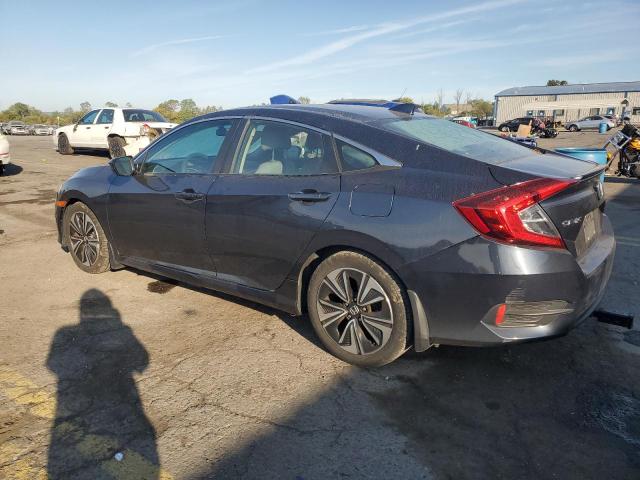 Photo 2 from auction – 2016 HONDA CIVIC EX with VIN 19XFC1F39GE217699