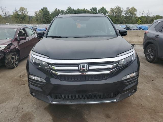 Photo 5 from auction – 2016 HONDA PILOT TOUR with VIN 5FNYF6H93GB028412
