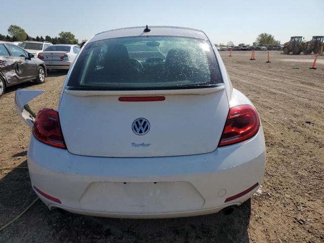 Photo 6 from auction – 2012 VOLKSWAGEN BEETLE TUR with VIN 3VWV67AT5CM658403