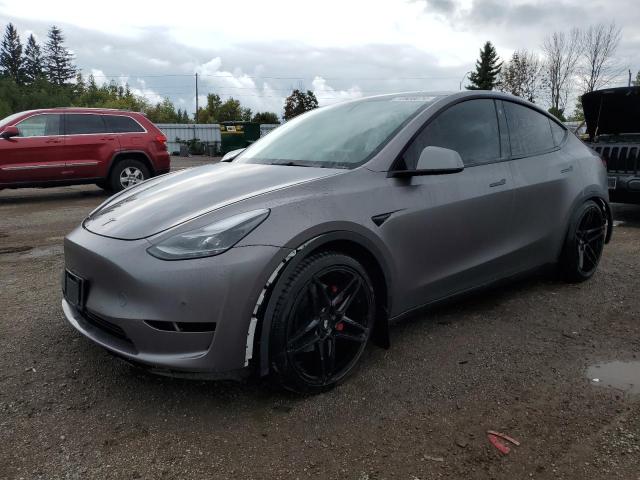TESLA MODEL Y 2021 with VIN 5YJYGDEF8MF197462 - Photo from auction