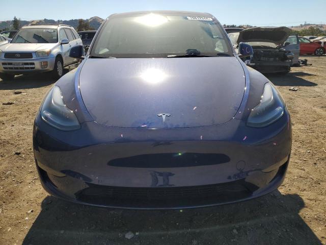 Photo 5 from auction – 2023 TESLA MODEL Y with VIN 7SAYGDEE0PF791560