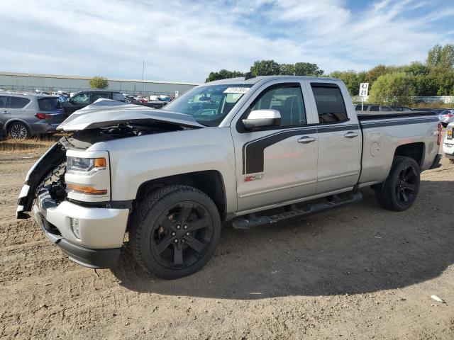 CHEVROLET SILVERADO 2017 with VIN 1GCVKREC4HZ145038 - Photo from auction