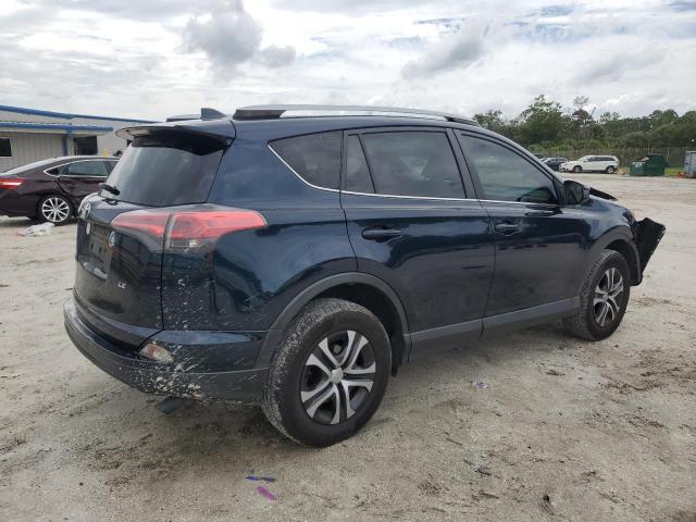 Photo 3 from auction – 2017 TOYOTA RAV4 LE with VIN JTMZFREV6HJ149176