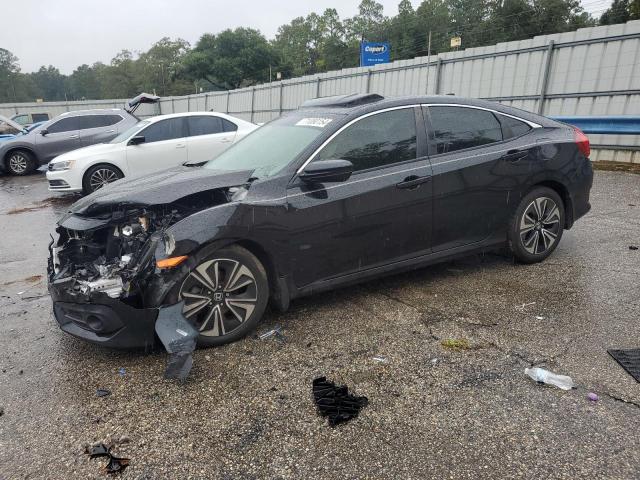 HONDA CIVIC EX 2018 with VIN JHMFC1F34JX031025 - Photo from auction