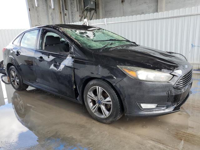 Photo 4 from auction – 2017 FORD FOCUS SE with VIN 1FADP3FE2HL242595