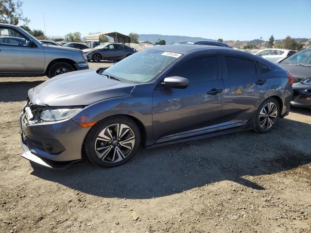 HONDA CIVIC EX 2017 with VIN 2HGFC1F35HH648984 - Photo from auction
