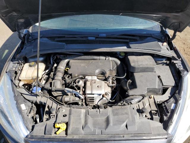 Foto 11 de la subasta – 2015 FORD FOCUS SE con VIN 1FADP3KE0FL348739