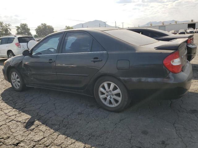 Photo 2 from auction – 2002 TOYOTA CAMRY LE with VIN 4T1BF30K02U001537