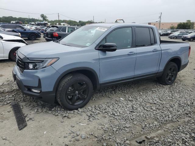 HONDA RIDGELINE 2023 with VIN 5FPYK3F80PB062058 - Photo from auction