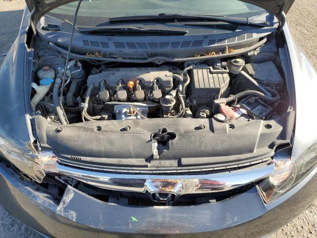 Photo 11 from auction – 2011 HONDA CIVIC LX with VIN 19XFA1F5XBE049037