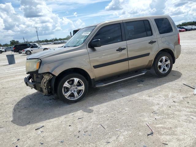 HONDA PILOT LX 2011 with VIN 5FNYF3H22BB013510 - Photo from auction