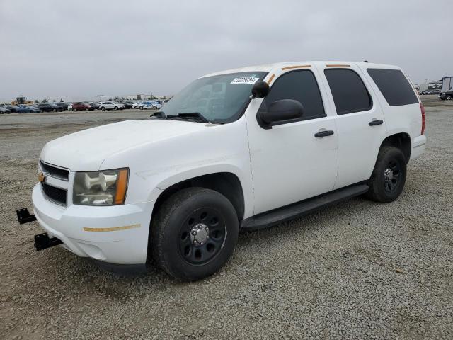 CHEVROLET TAHOE POLI 2014 with VIN 1GNLC2E02ER185607 - Photo from auction