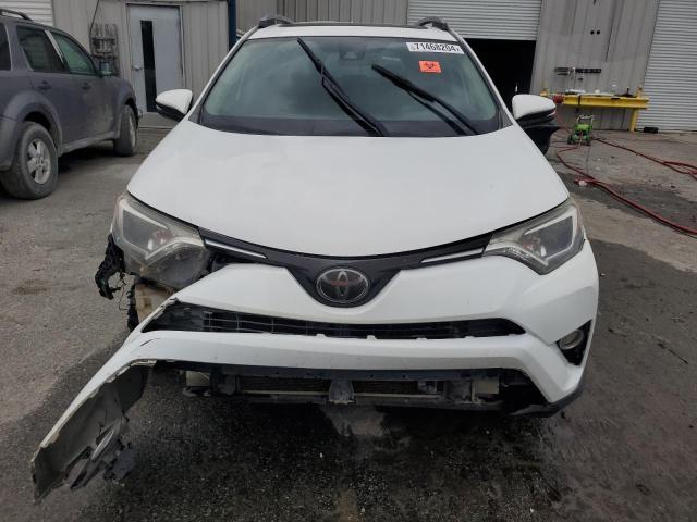 Photo 5 from auction – 2017 TOYOTA RAV4 XLE with VIN JTMWFREVXHD092983