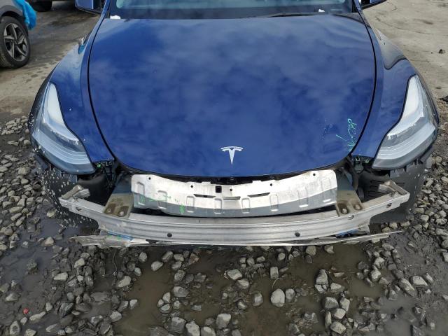 Photo 12 from auction – 2022 TESLA MODEL Y with VIN 7SAYGDEE3NF375774