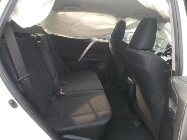 Photo 11 from auction – 2018 TOYOTA RAV4 LE with VIN JTMBFREV5JJ253276