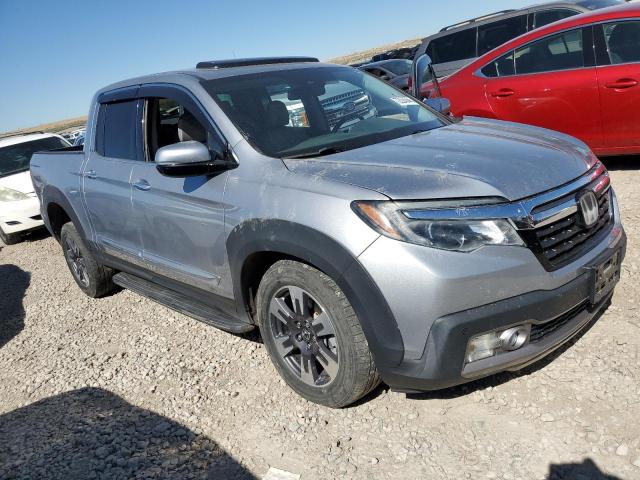 Photo 4 from auction – 2025 HONDA RIDGELINE with VIN 5FPYK3F79JB008238