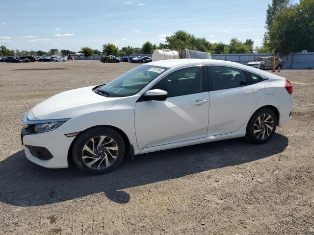 Photo 1 from auction – 2018 HONDA CIVIC LX with VIN 2HGFC2F65JH036693