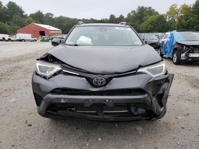 Photo 5 from auction – 2017 TOYOTA RAV4 LE with VIN JTMBFREV3HJ113639
