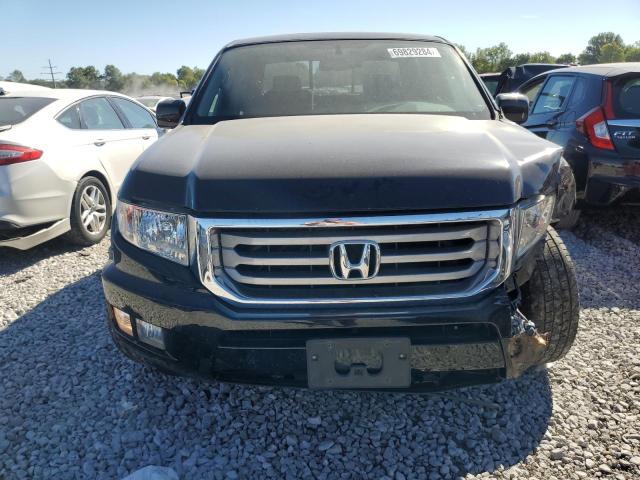Photo 5 from auction – 2014 HONDA RIDGELINE with VIN 5FPYK1F58EB008112