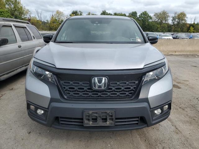 Photo 5 from auction – 2020 HONDA PASSPORT E with VIN 5FNYF8H57LB010143