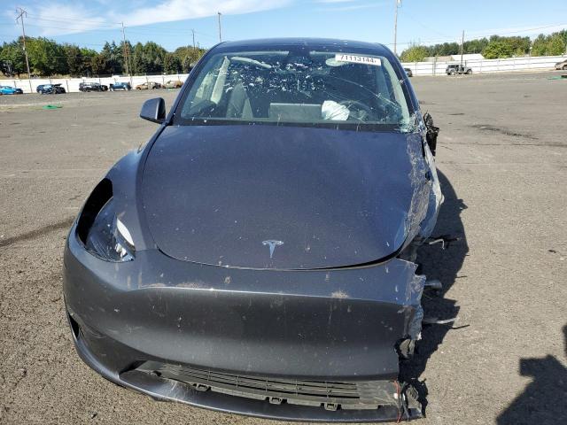 Photo 5 from auction – 2023 TESLA MODEL Y with VIN 7SAYGAEE1PF897207