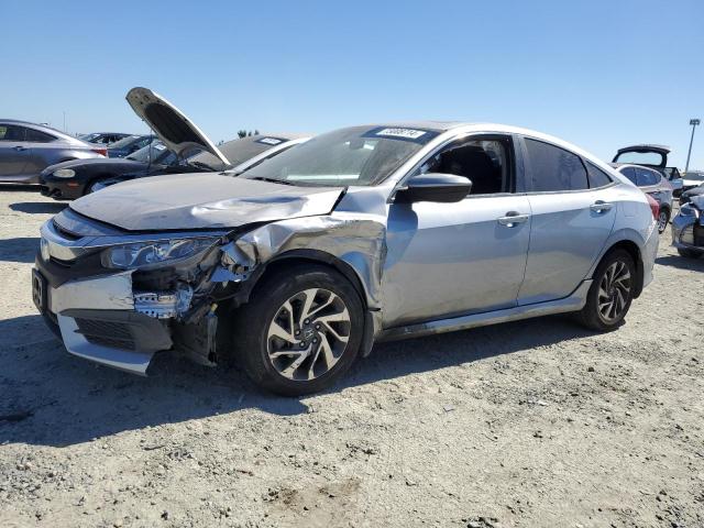 HONDA CIVIC EX 2017 with VIN 19XFC2F77HE204962 - Photo from auction