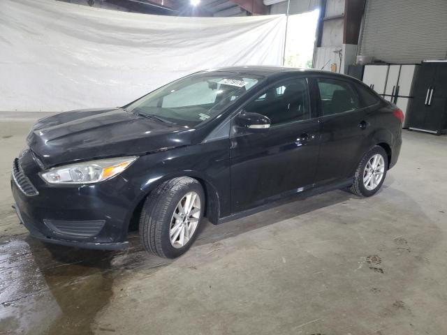 FORD FOCUS SE 2016 with VIN 1FADP3F2XGL215083 - Photo from auction