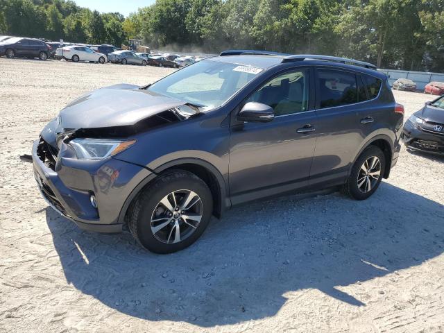 TOYOTA RAV4 XLE 2017 with VIN JTMRFREV9HJ173715 - Photo from auction