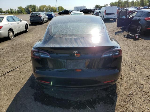 Photo 6 from auction – 2021 TESLA MODEL 3 with VIN 5YJ3E1EA7MF857414