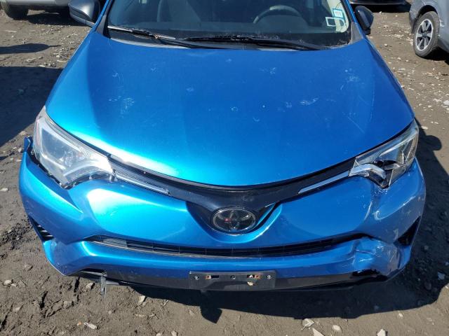 Photo 12 from auction – 2018 TOYOTA RAV4 LE with VIN JTMBFREV6JJ744066