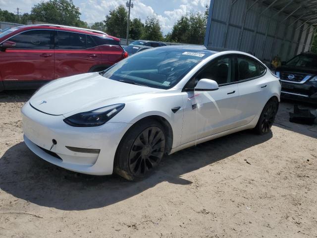 TESLA MODEL 3 2022 with VIN 5YJ3E1EC9NF261871 - Photo from auction